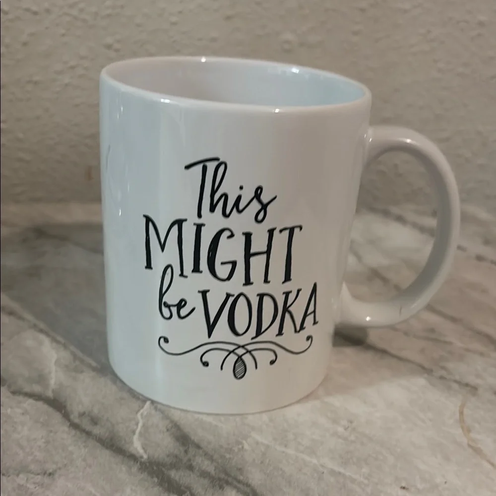 This might be vodka, coffee mug 14 ounce no chips, cracks or stains